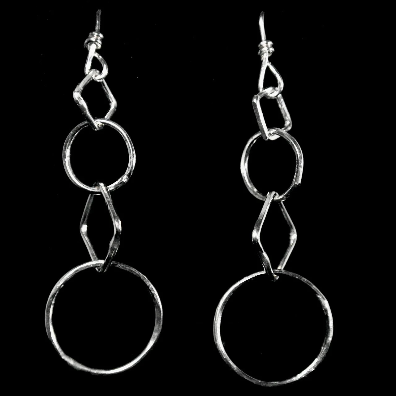 56-1123 Tony Davis Hand Hammered Open Circles and Diamonds French Hook Earrings $128.jpeg