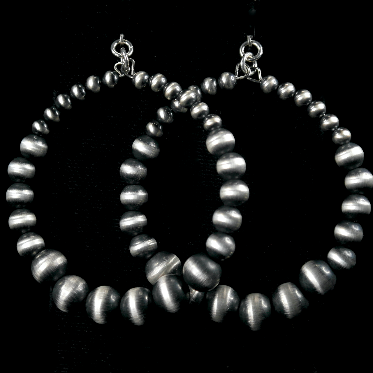 94-923 Sterling Silver Navajo Pearl Hoop Earrings $115.png