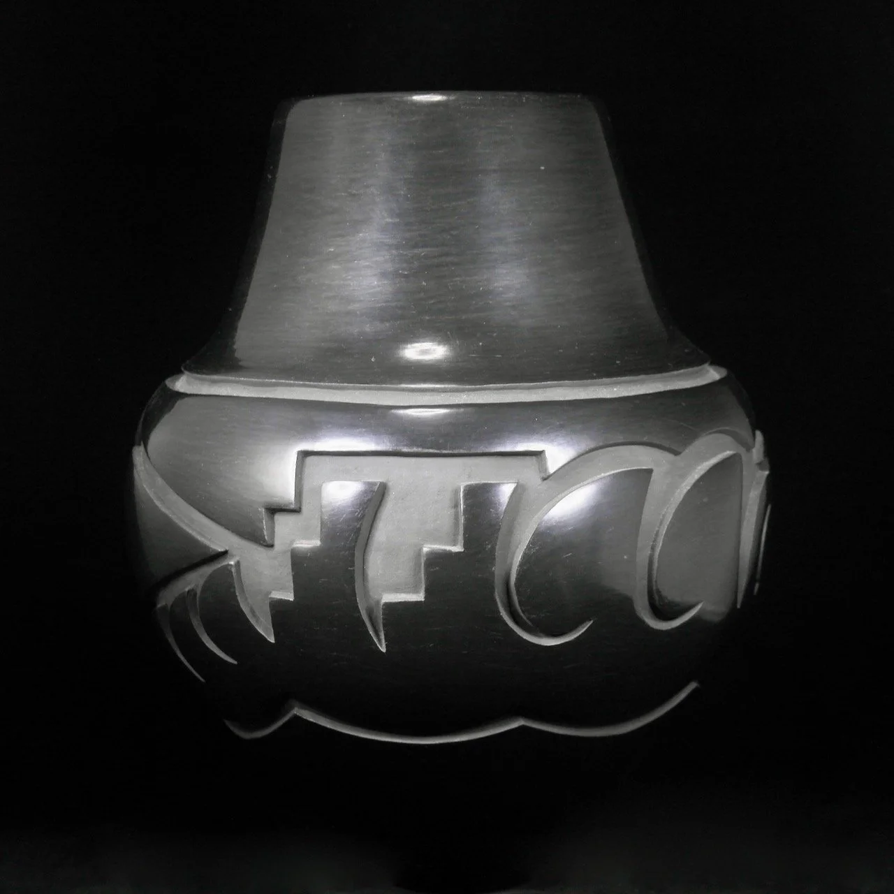 86-9 Sherry Tafoya Black Hand Coiled and Etched Pottery.jpeg