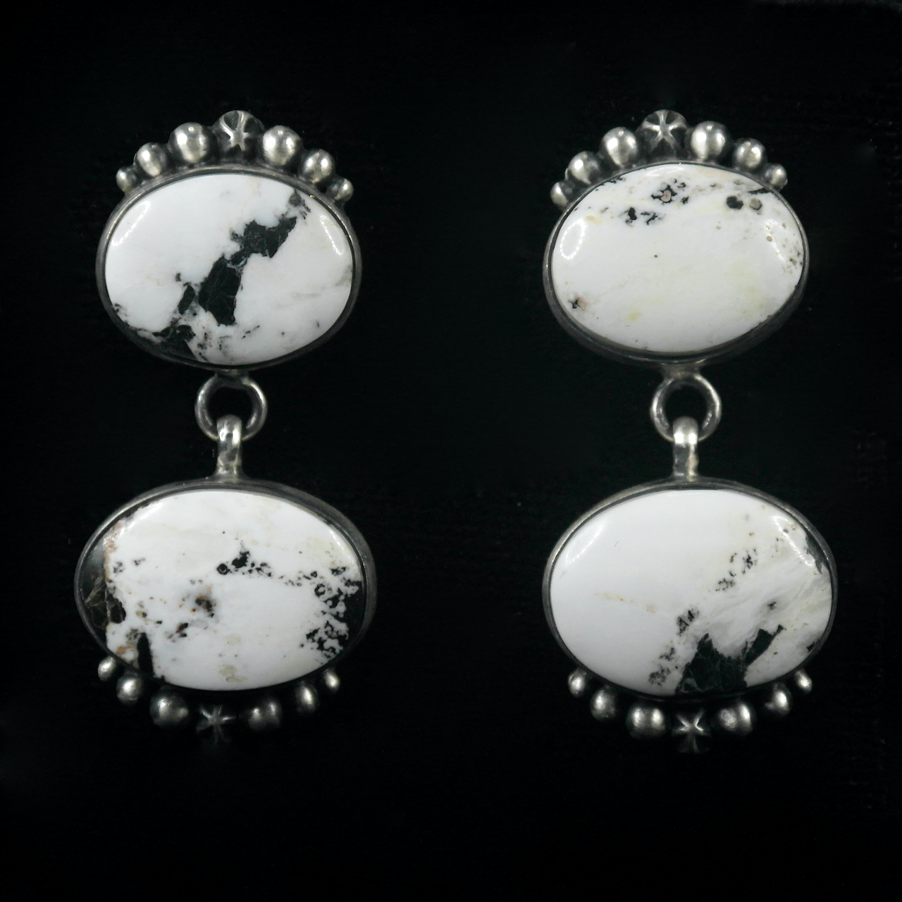 94-925 Sterling Silver White Buffalo 2-Stone Earrings $275.png