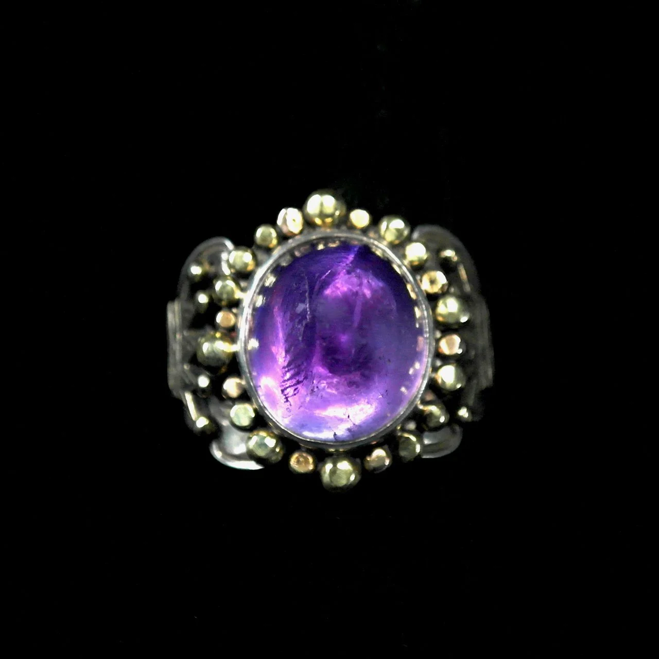 182-117 Kit Carson %22Conehead%22 Sterling 18k gold and Amethyst Ring $1200.jpg