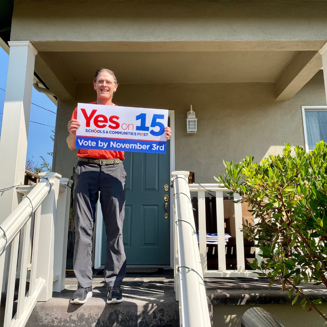 Volunteer Paul with Sign.png