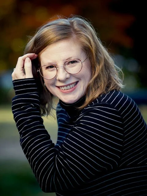 Kayce Hodos, PMH-C, a perinatal mental health therapist in Wake Forest, NC, offering online therapy and coaching for moms.