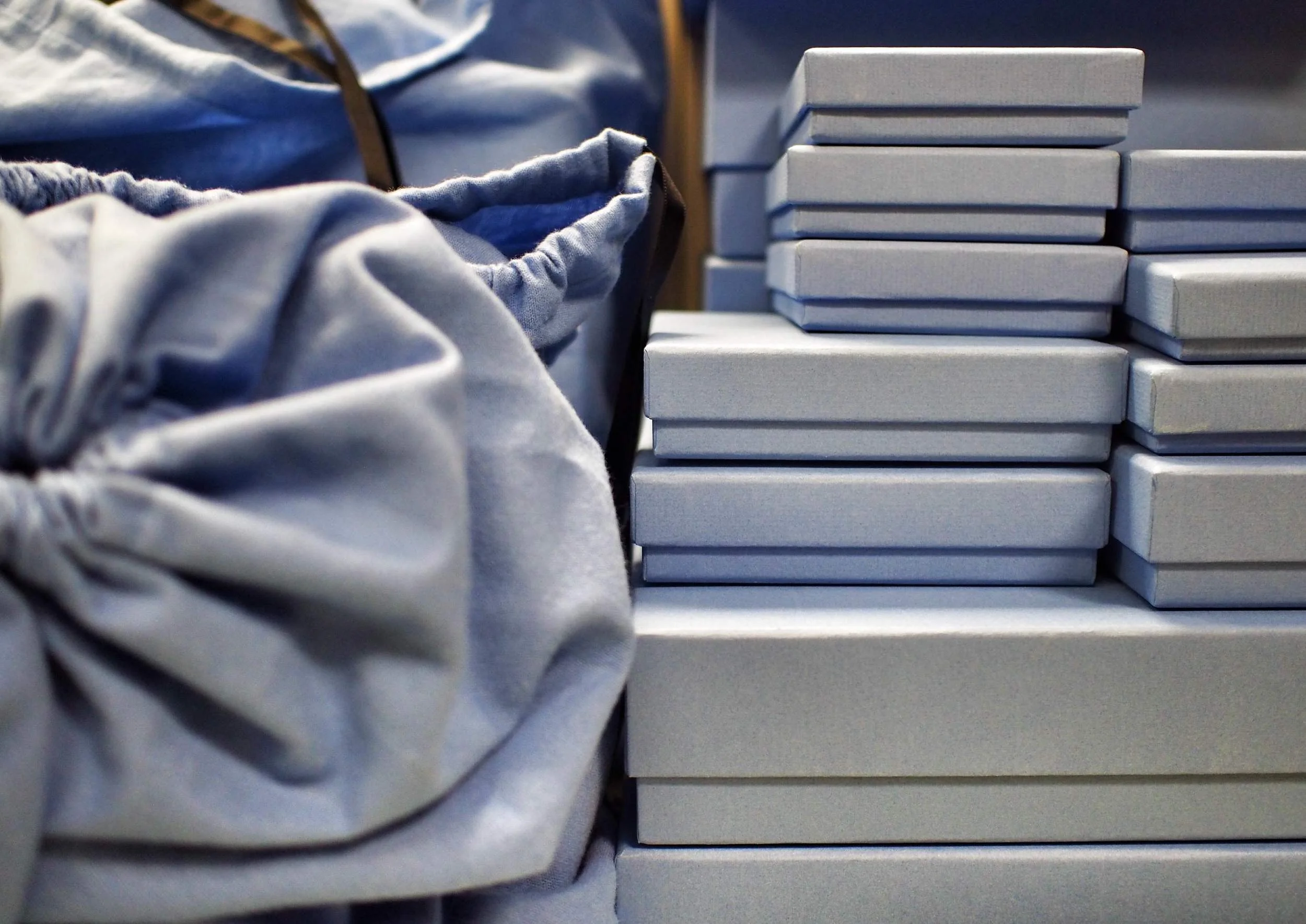 Stacks of Nile Blue boxes