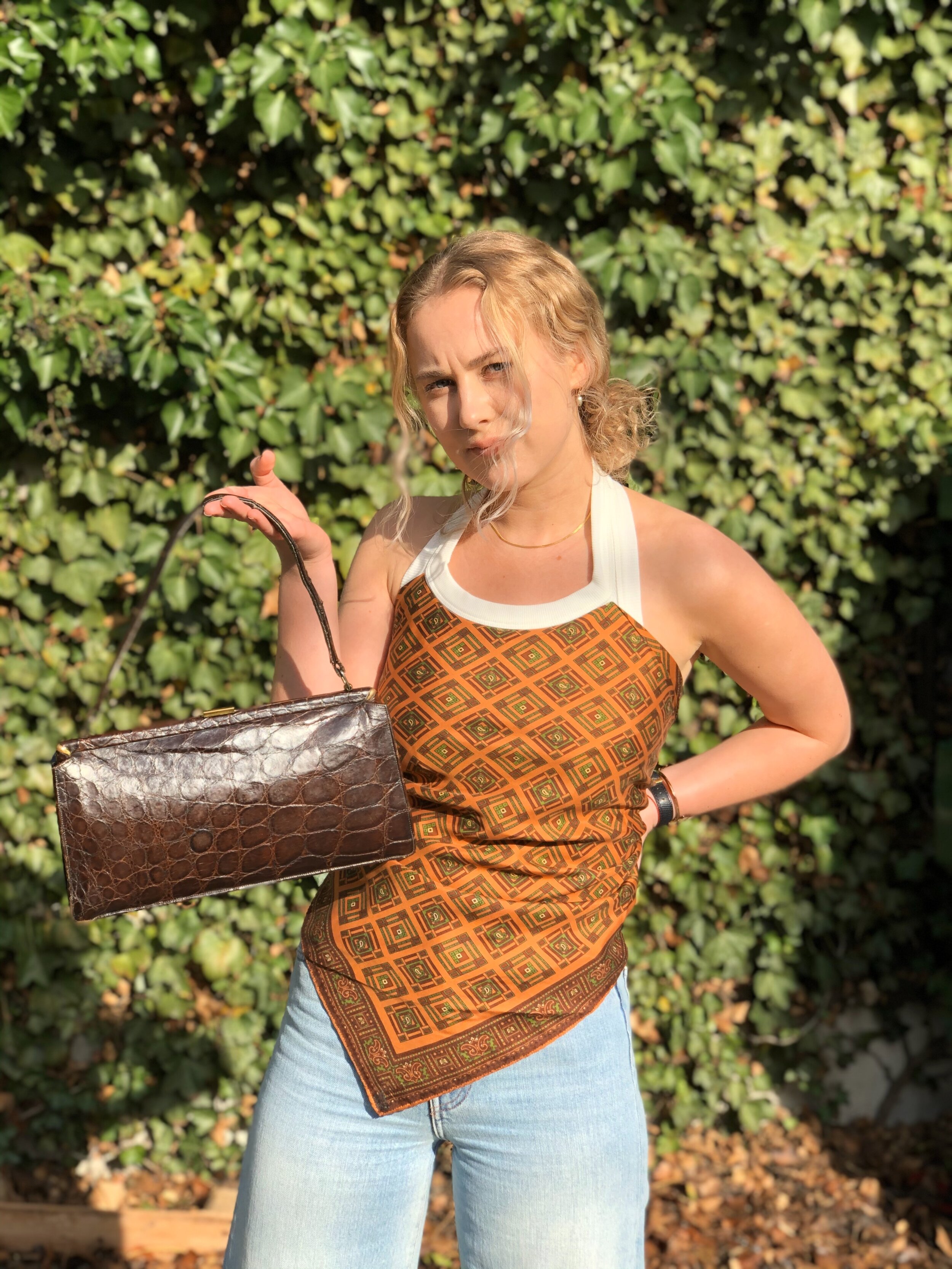  Erika Cavallini turned this exceedingly cool vintage scarf into a groovy top. We have 3 in store. Each is totally unique and all are dreamy.  Bonus item: This vintage bag - because these two pieces belong together. 