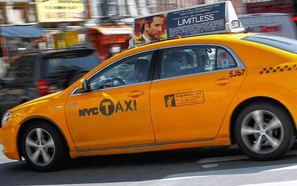 Rooftop Advertisement on NYC Taxi