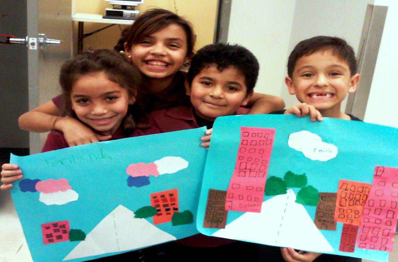 After-school participants show off their art projects