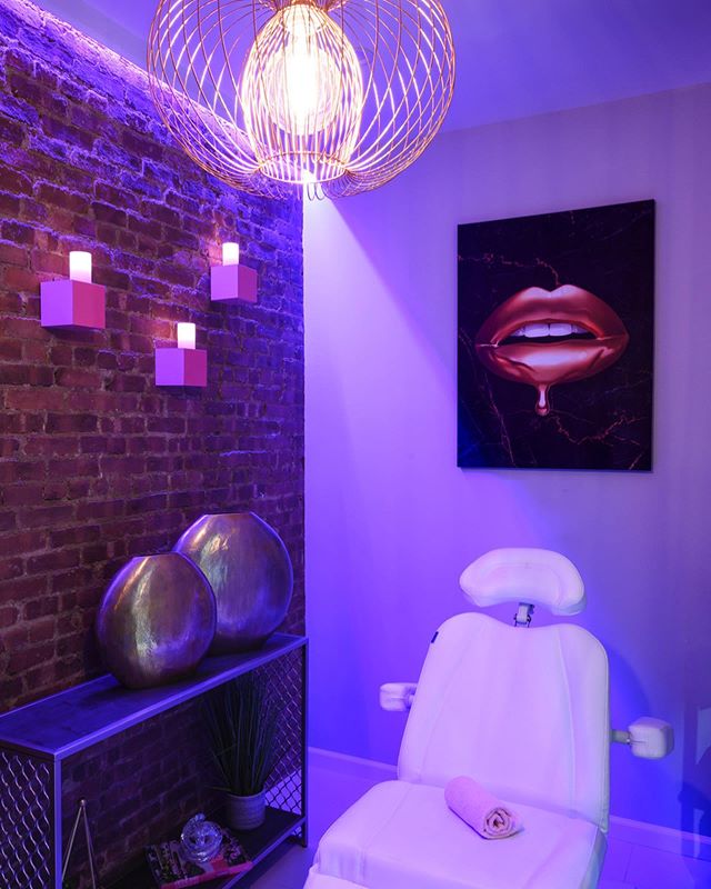 Pink wall wash lights in the treatment rooms give the exposed brick a literal “glam glow”...There’s beauty all around in this new medical spa. Thanks for the awesome praise @americanspamag !!!
