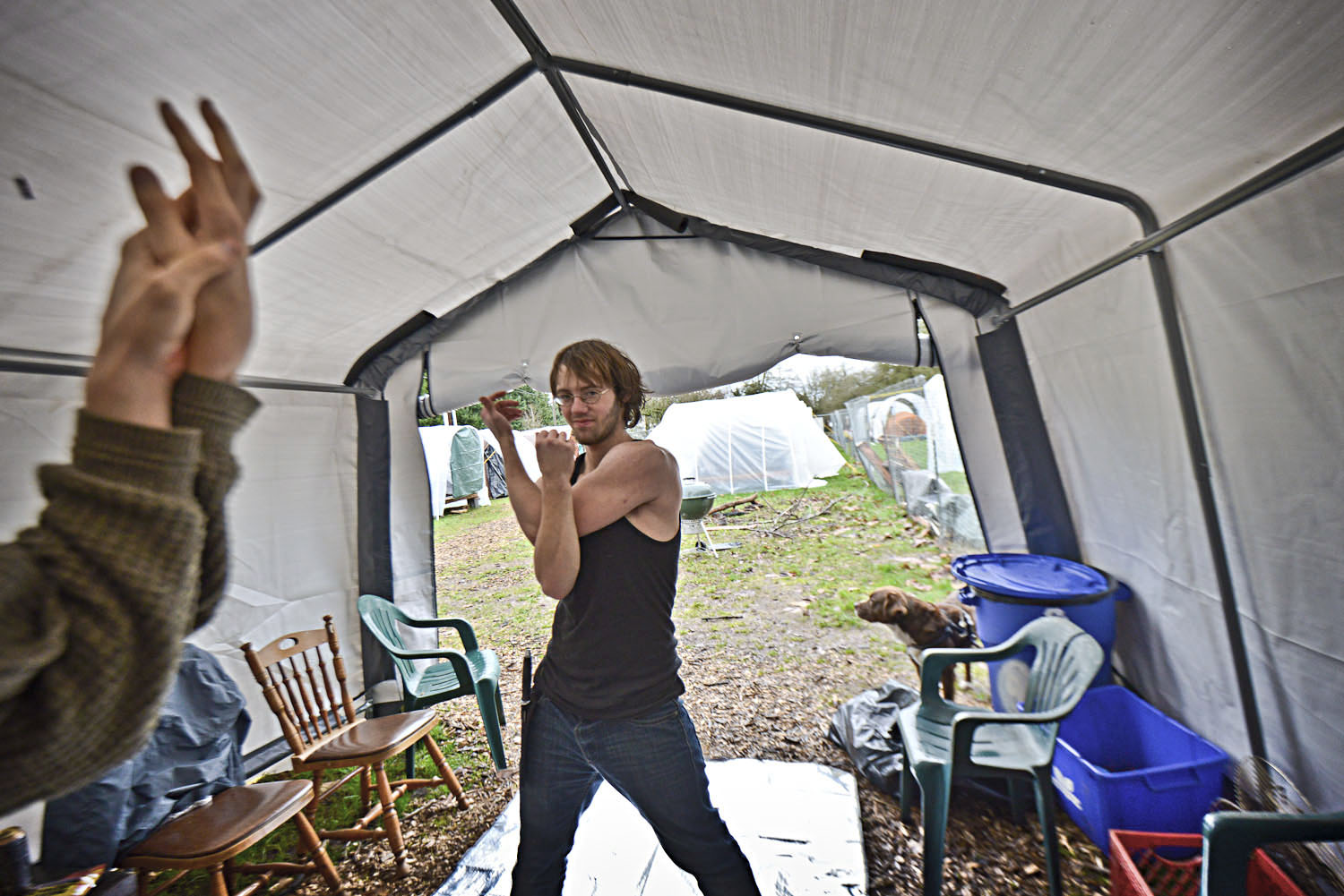 Eugene, Ore. - A member of the Nightingale Health Sanctuary who goes by Angel, 18, is participating in the Saturday yoga meditation. By: Debra Josephson