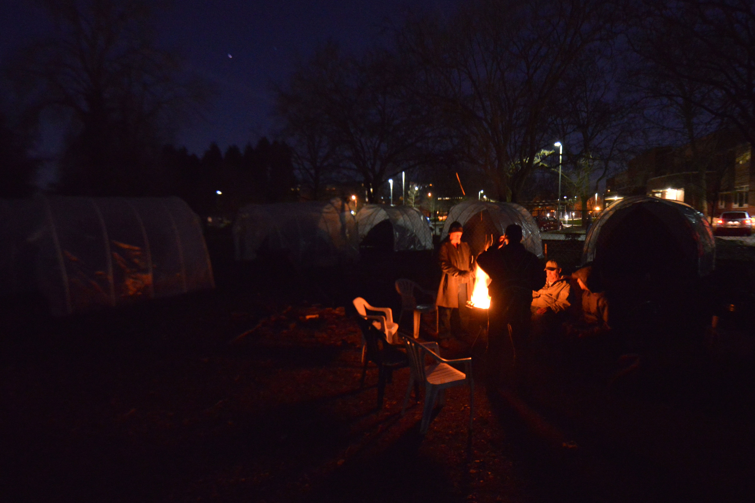 Eugene, ORE - On cold nights, a controlled bonefine is made to keep warm and to social among the Nightingale Health Sanctuary. By: Debra Josephson