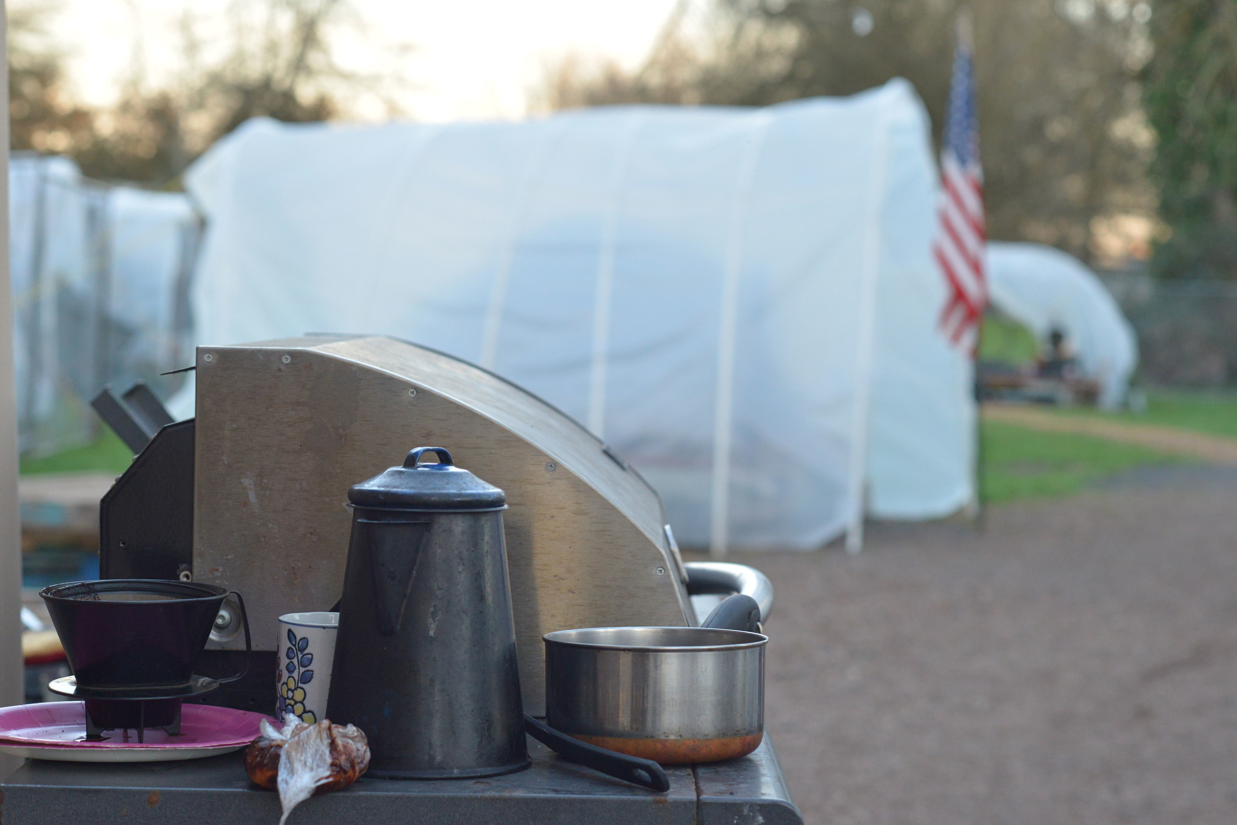 Eugene, ORE - Cast iron Coffee pot and kitchenware compatible to use with the propane grill and heaters. No electricity is available at rest stop. By: Debra Josephson