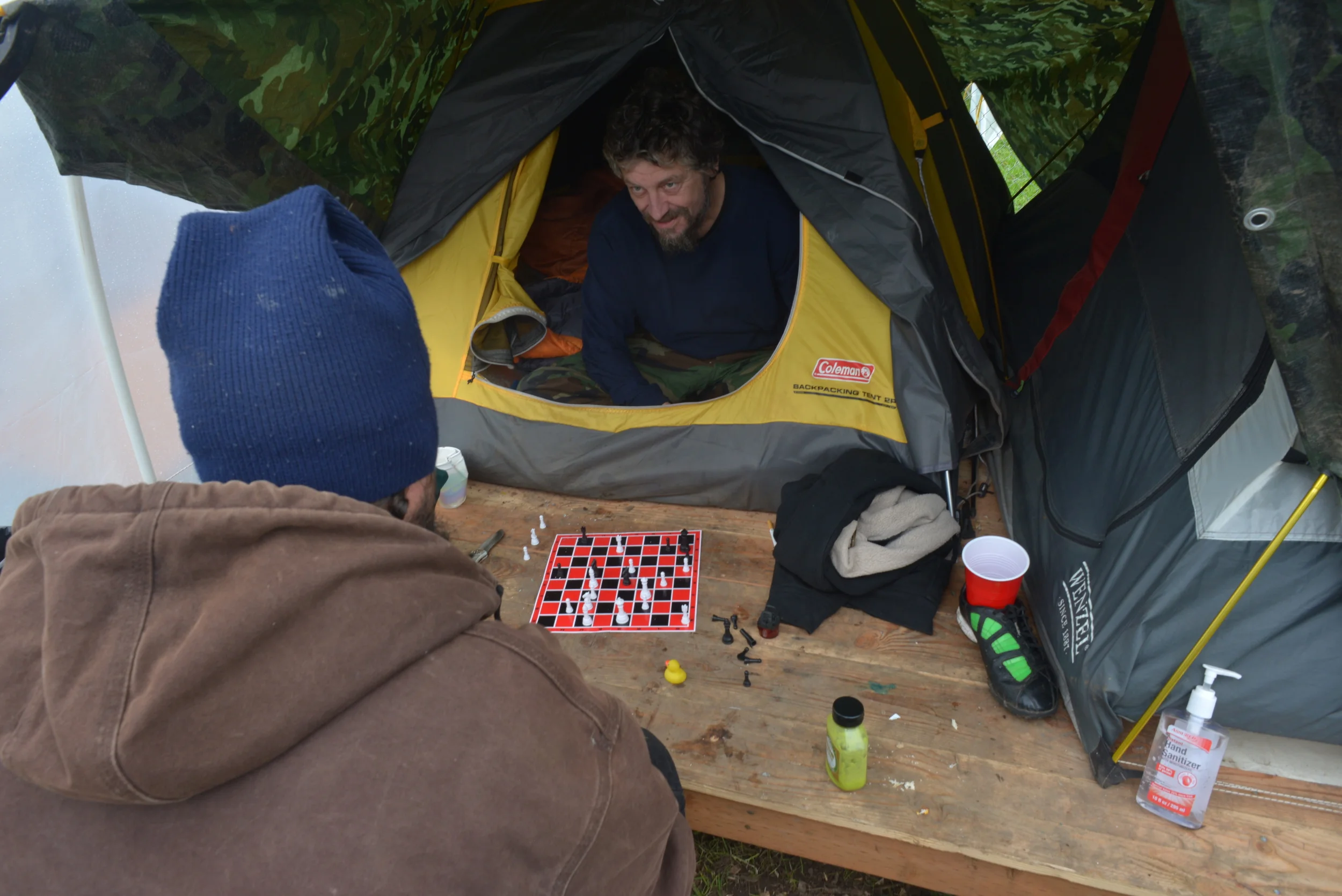  Eugene, ORE - Residents of the Nightingale Health Sanctuary playing chess in their conestega housing. By: Debra Josephson 