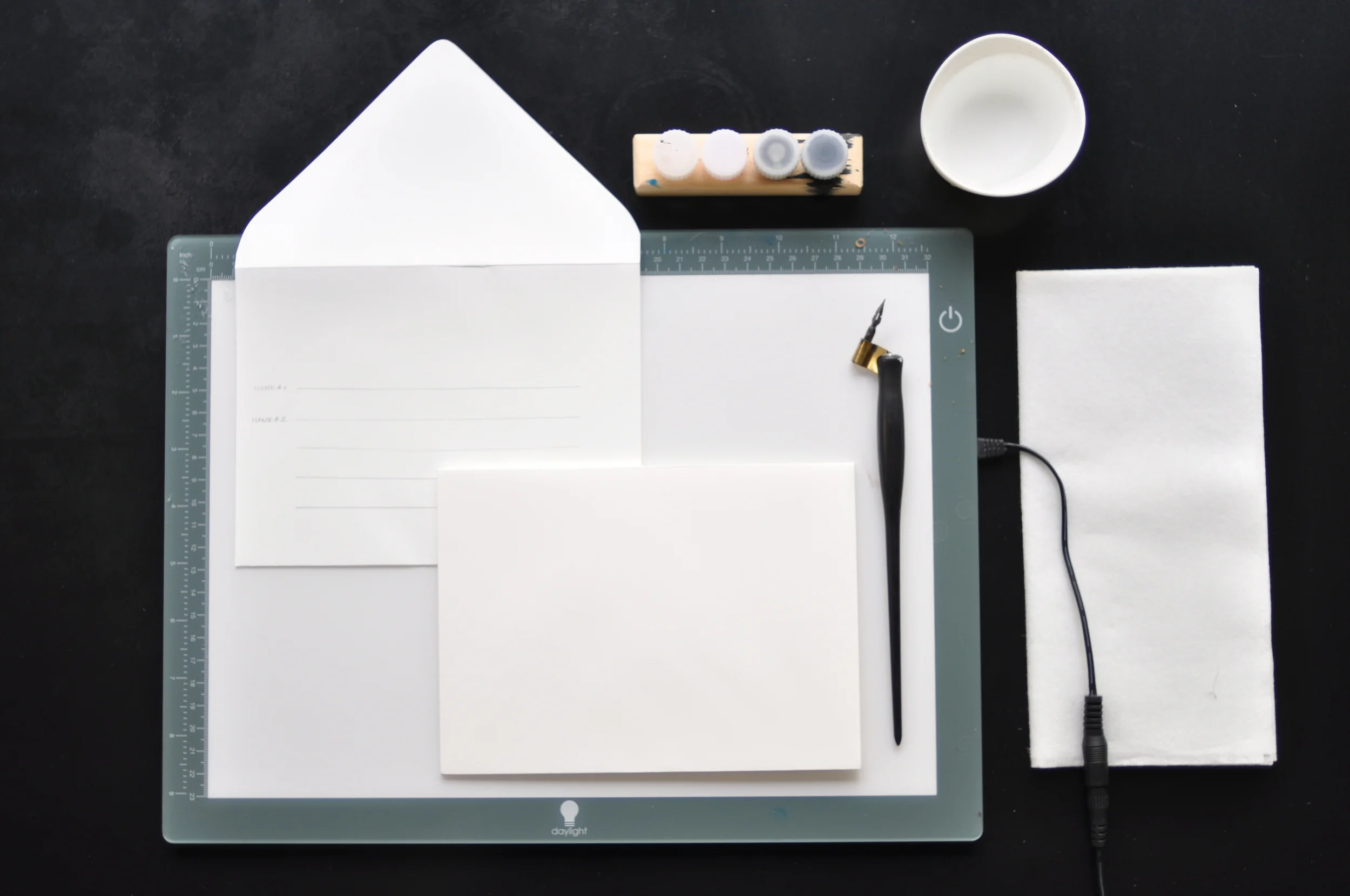 What you need: Lightpad, guidelines, and all your basic calligraphy near by!