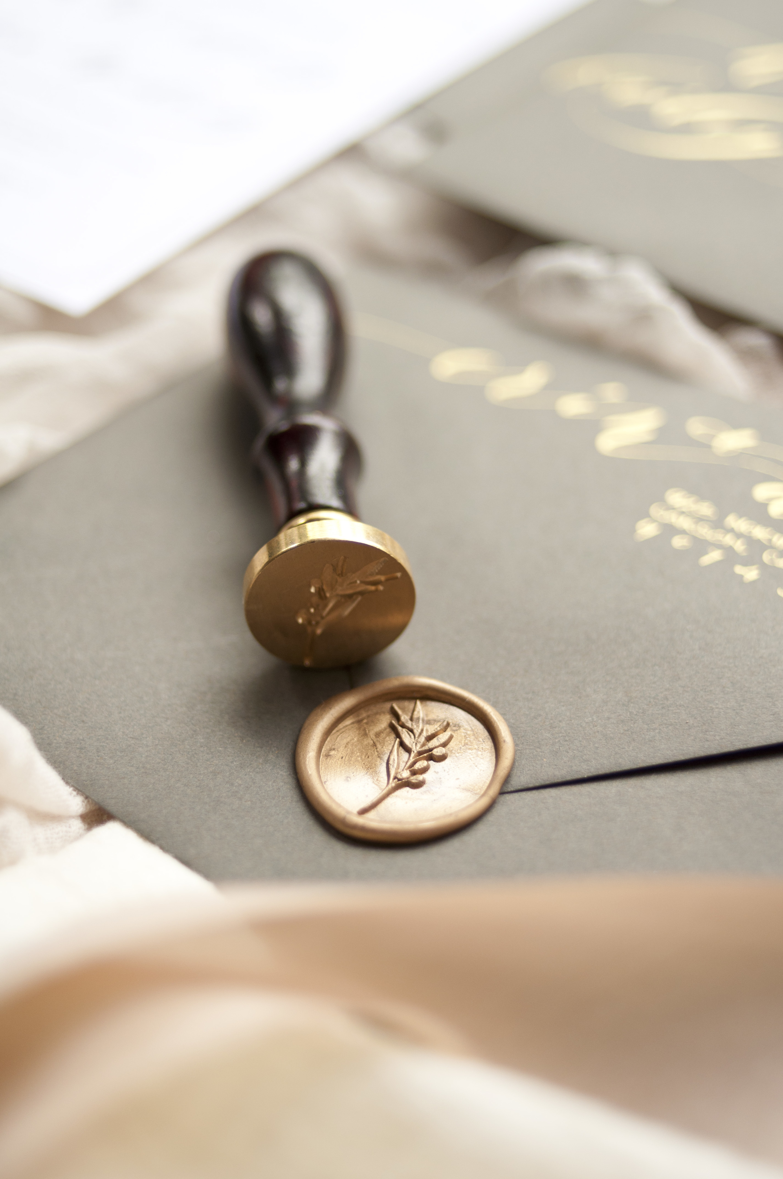 So let's end this tutorial with a seal. A wax seal to be precise ;) Check out my custom waxseal line in Stamptitude too !