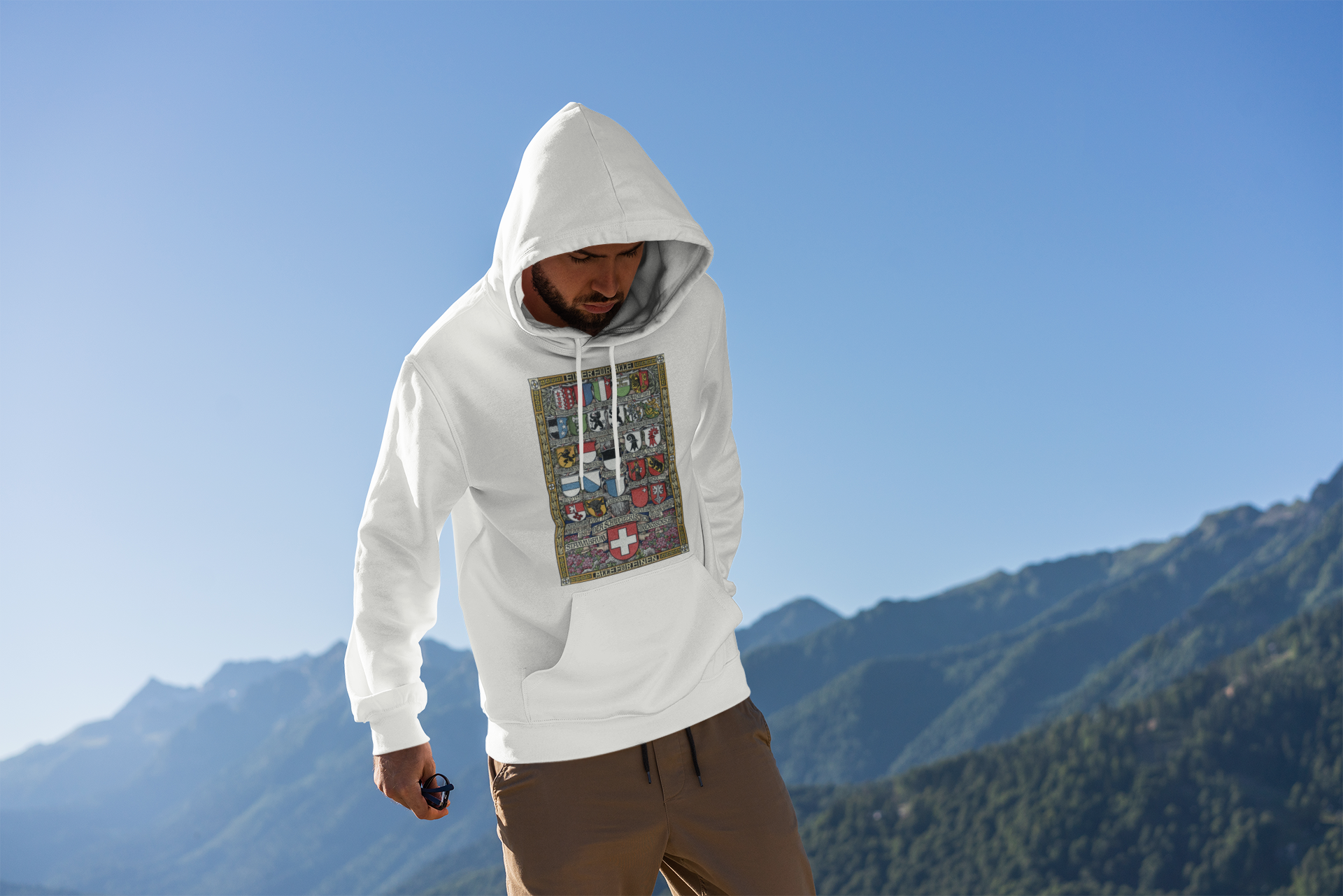 mockup-of-a-man-wearing-a-hoodie-with-mountains-in-the-background-2770-el1-2.png