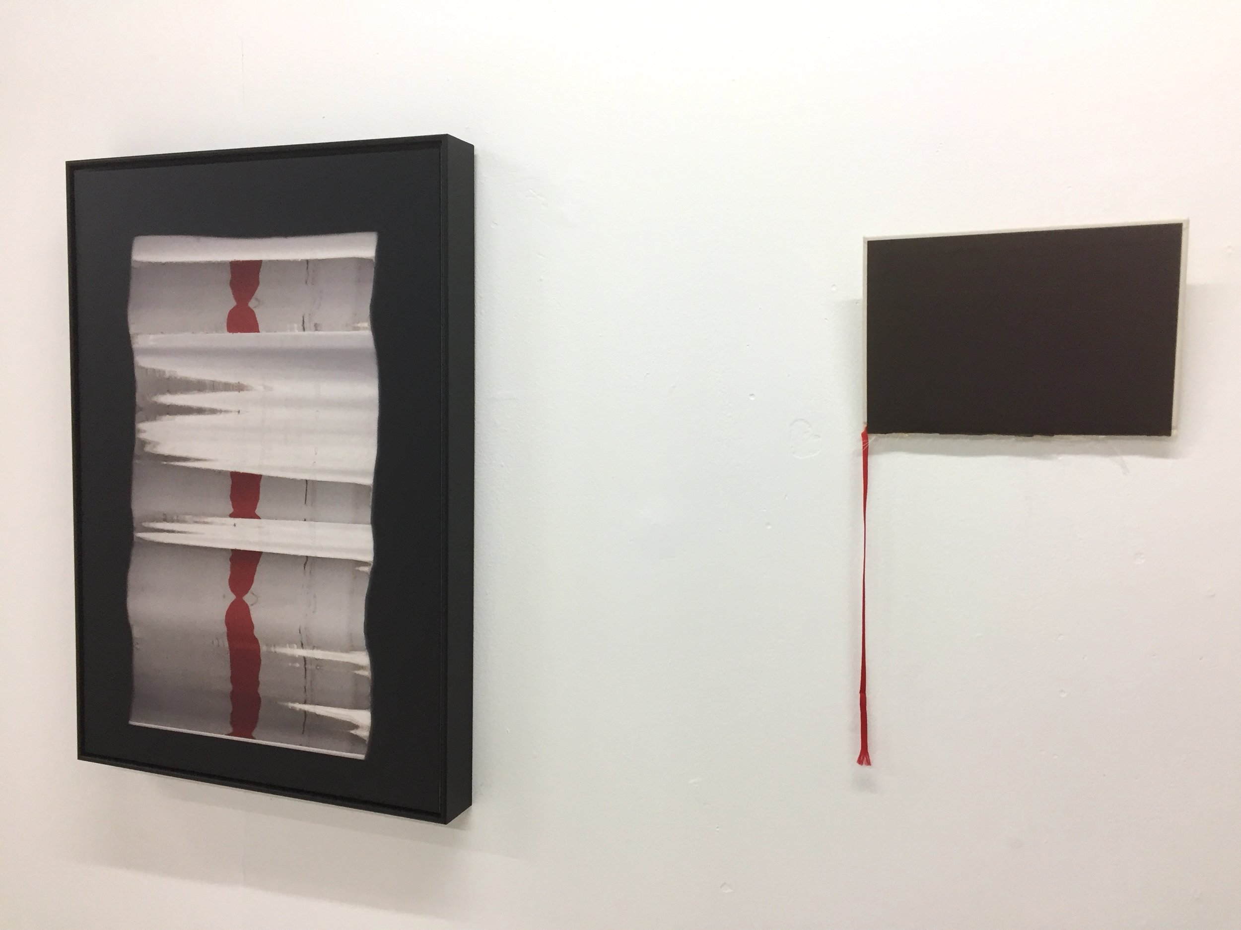 Installation View: Black Zodiac I (left); With What Words With What Silence III (right). 