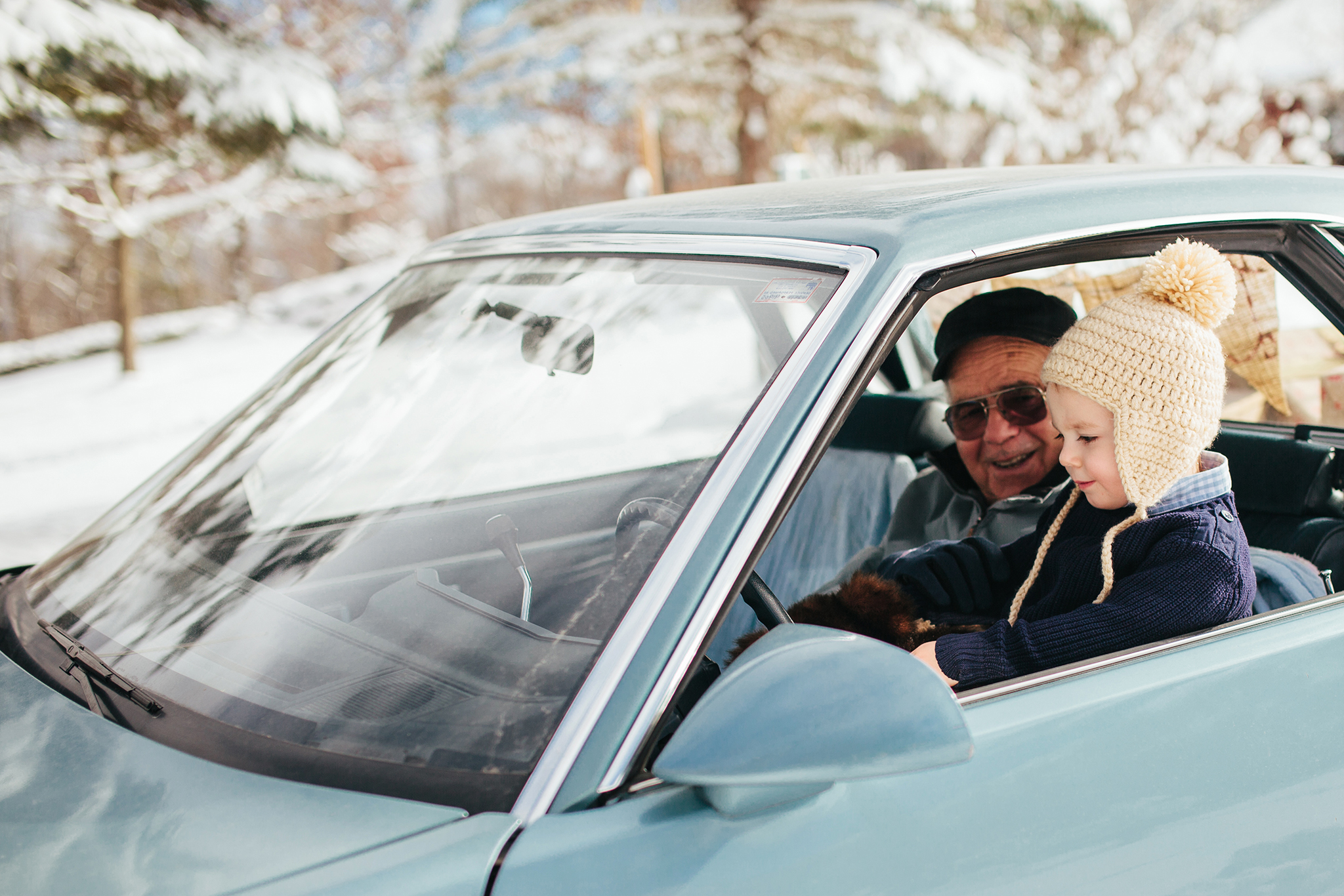 grandpa and grandson in old classic car web.jpg