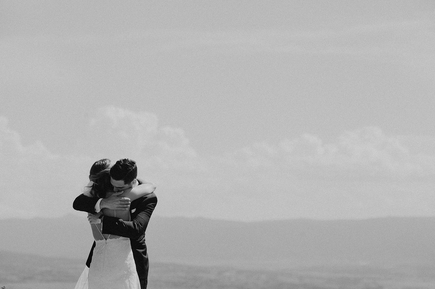 denver-colorado-wedding-first-look-hugging-bride-groom-bw.jpg