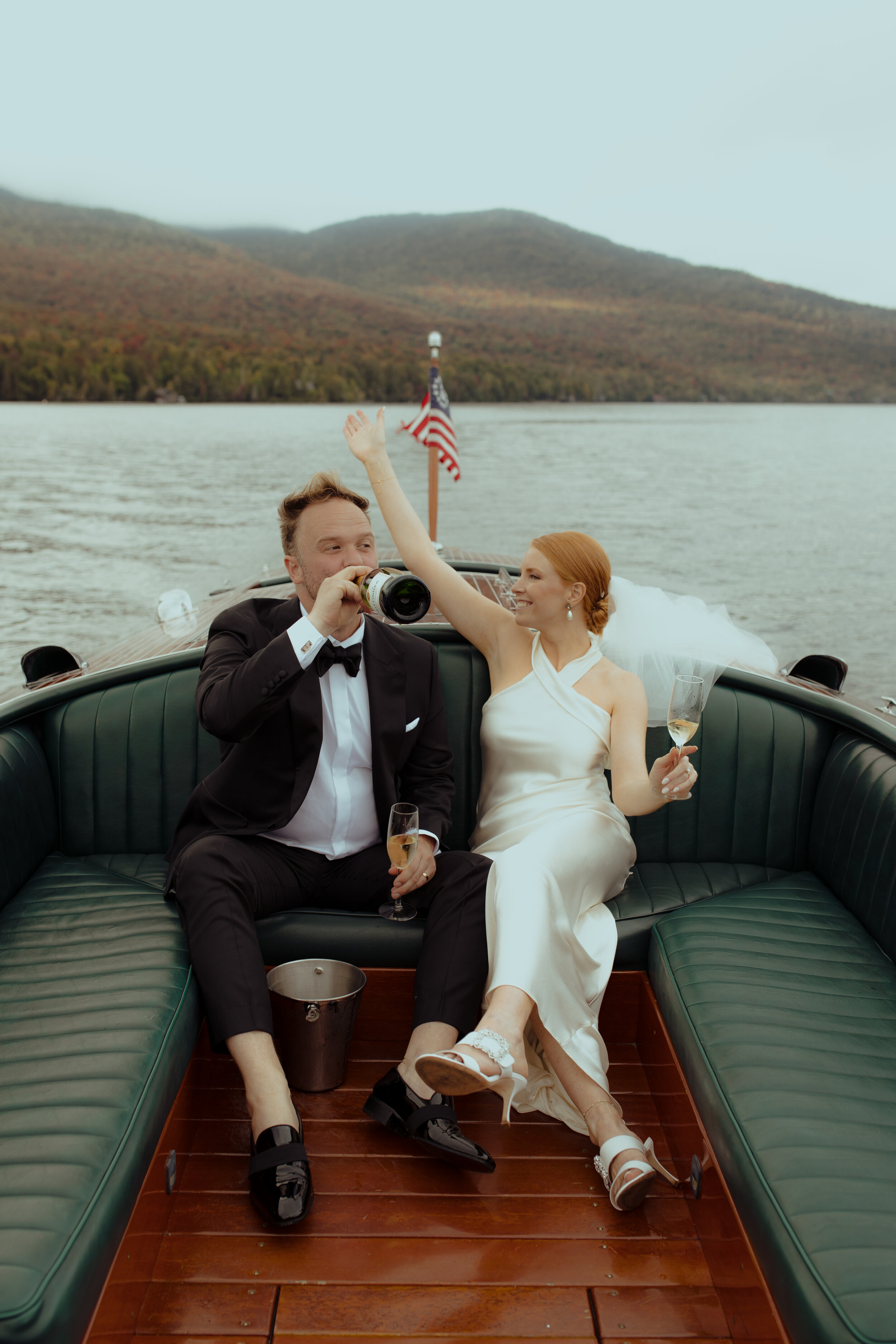 lake-placid-lodge-wedding-champagne-boat-ride-9.jpg