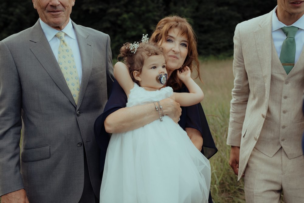 057_cameron-alexa-wedding-365_flower girl grandmother candid .jpg