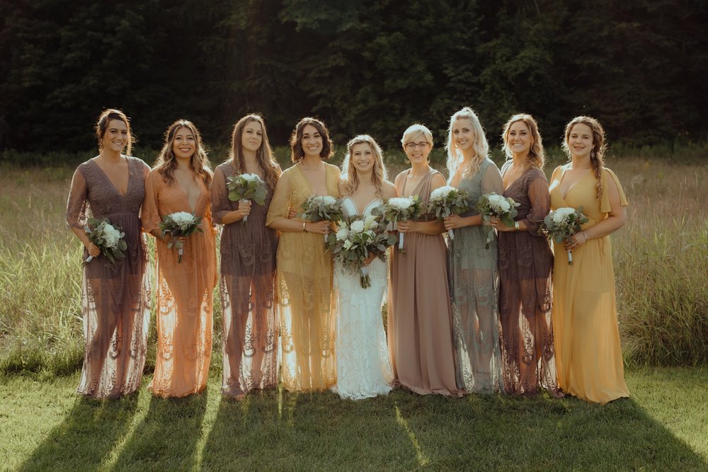 062_cameron-alexa-wedding-407_bridesmaids dresses group photo sunset golden hour .jpg