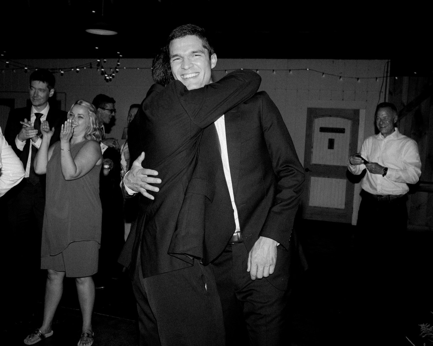 119_cameron-alexa-wedding-848_black and white hug .jpg