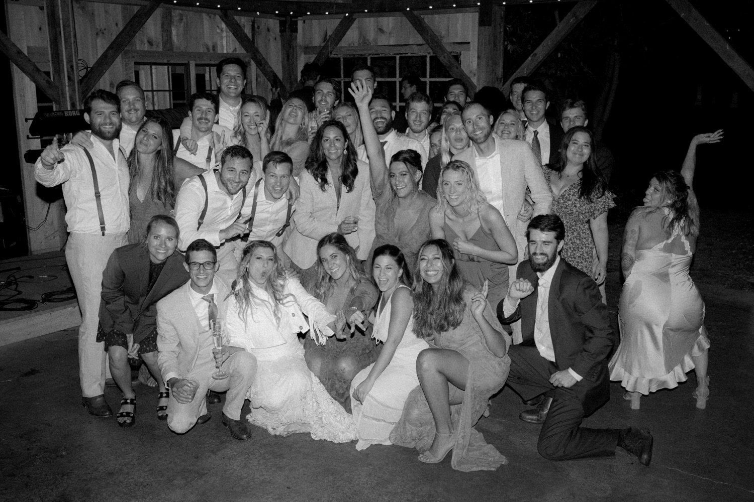 134_cameron-alexa-wedding-855_black and white group photo end of night wedding .jpg