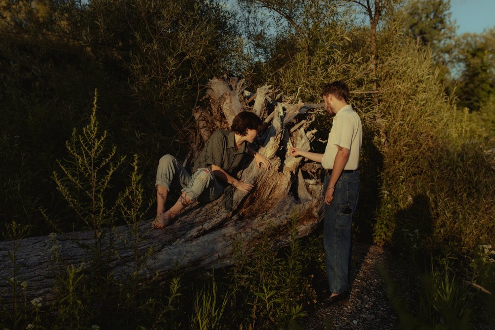 08_young couple exploring fallen tree outdoors in vermont .jpg