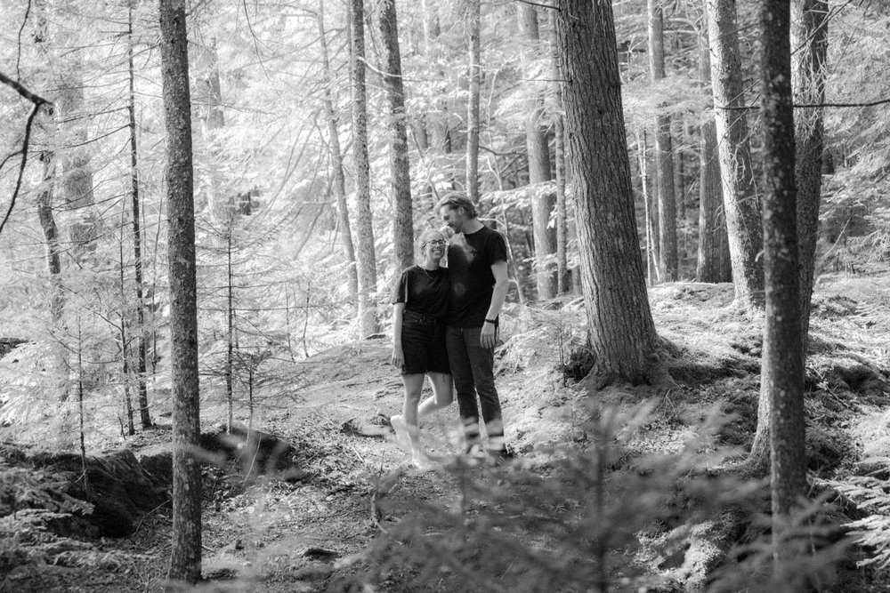 10_black and white couple in the trees at texas falls hancock vermont .jpg