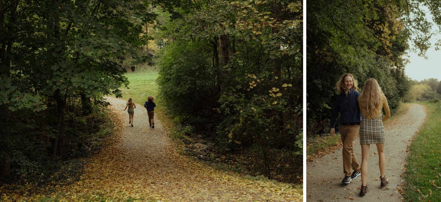 14_young couple on walk together in the fall at shelburne farms vermont _couple running playfully down a leaf covered path at shelburne farms vermont .jpg