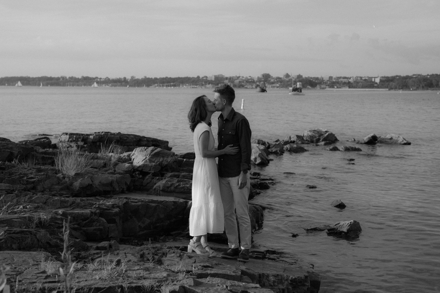 19_young couple kissing at lake champlain waterfront oakledge beach vermont .jpg