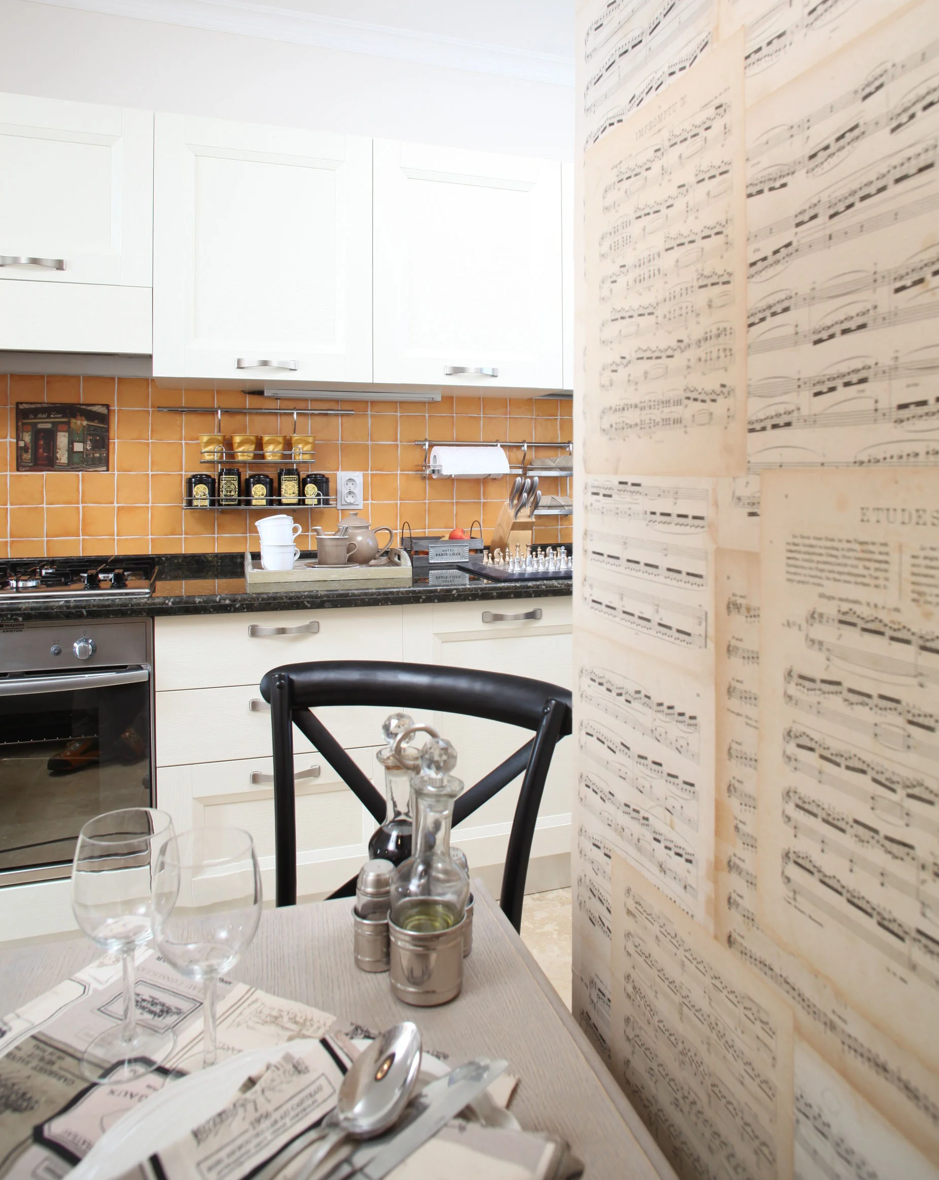 walls covered with old music scores - picture Casa Lux