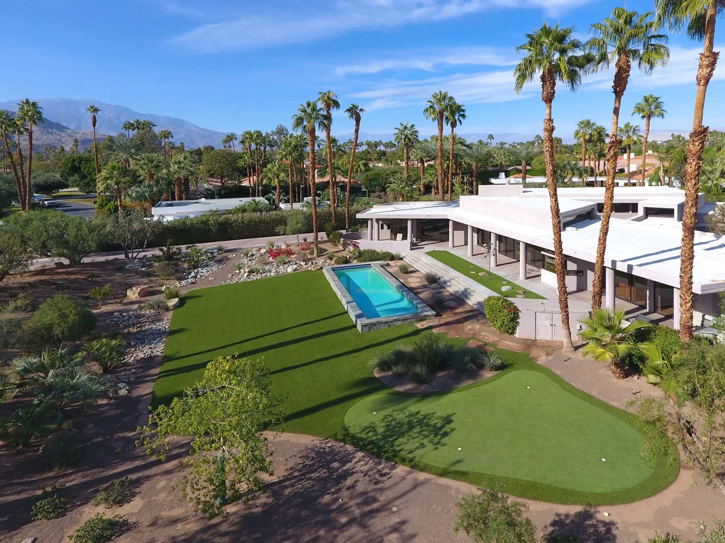 FRONT YARD POOL AND HOUSE TO MOUNTAINS AERIAL WEBSITE.jpg