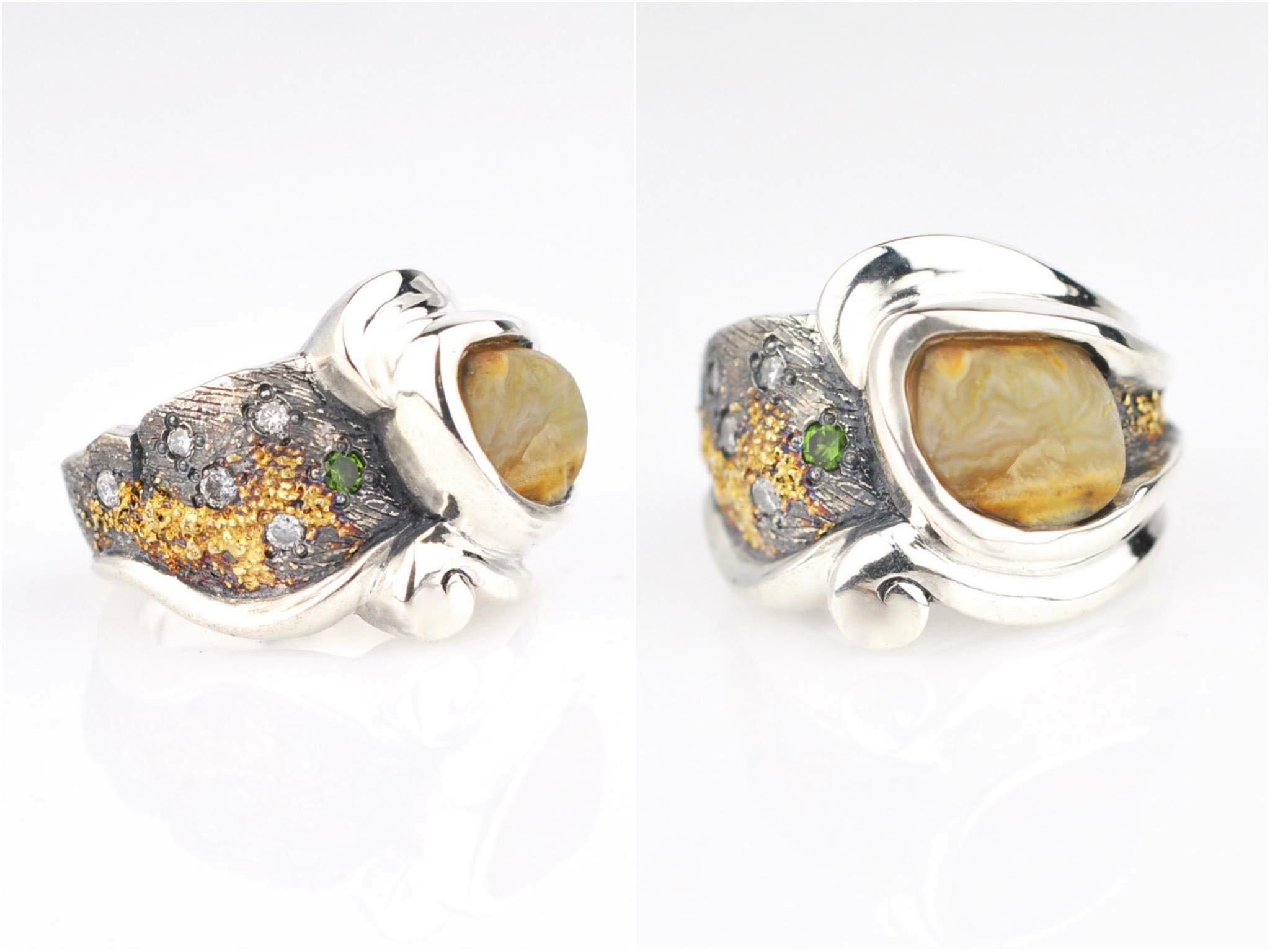 How many times have you seen a pebble be the featured center stone of a ring? This design is a visual representation of the impact love can have on a person. Pretty cool, eh?
Hand carved in wax, cast in silver, fused with 18k gold, and set with an u
