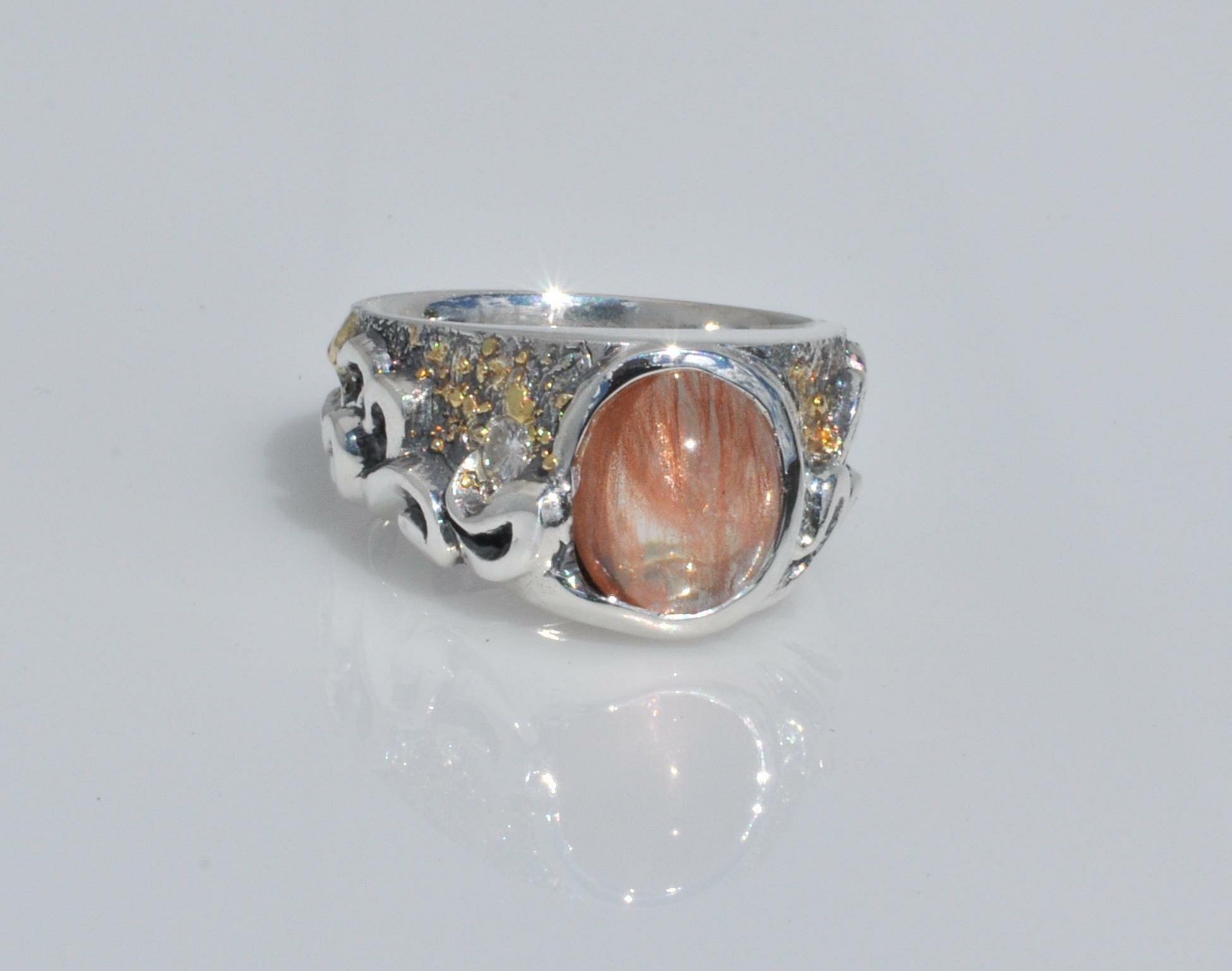 A Waylon Rhoads Jewelry Original Oregon Sunstone Ring. Made in 2016, this design represented a big step forward in my exploration of hybridization of that raw look that fused high karat gold on silver gives us, with the refined look of the vine scrol