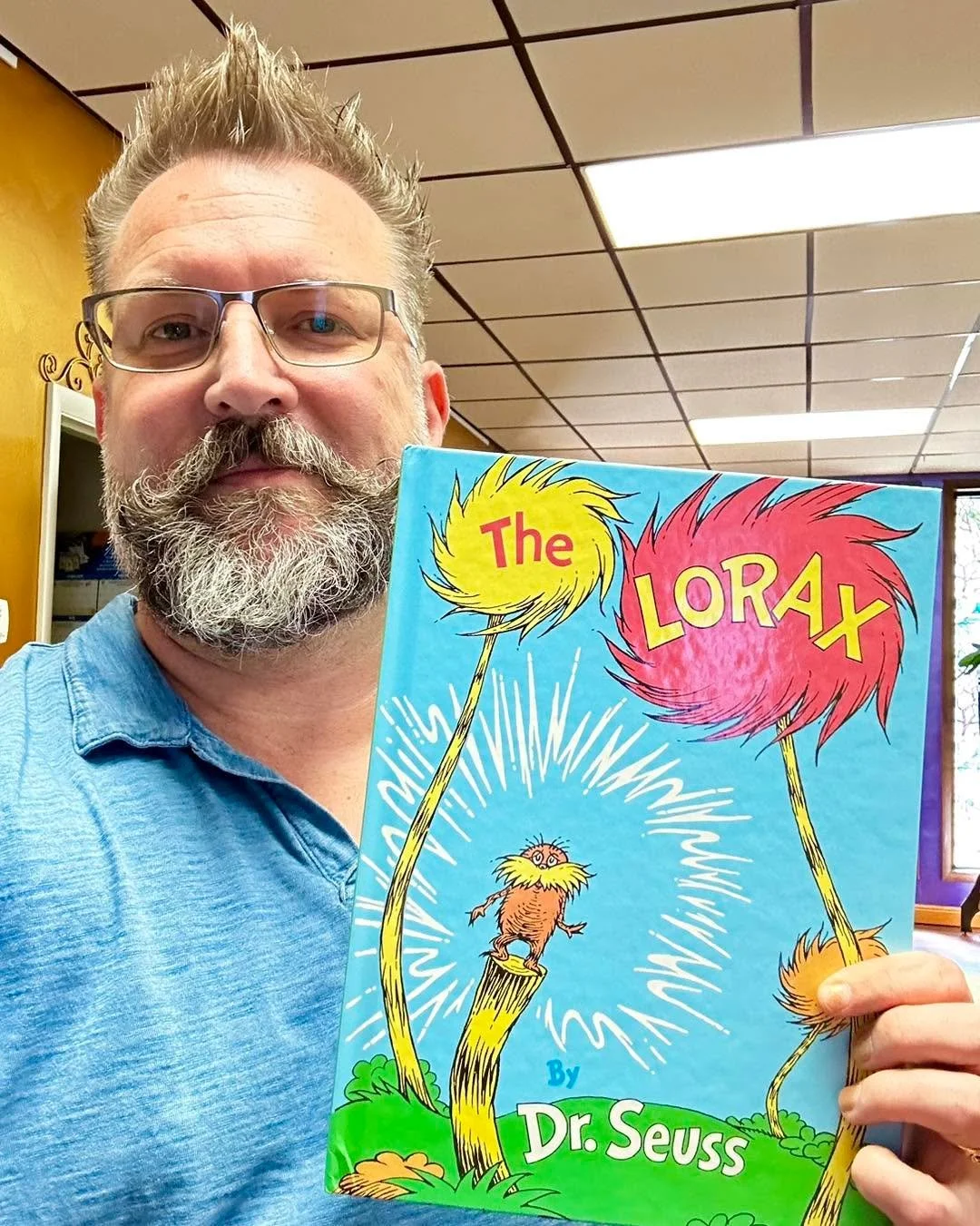 It is a beautiful day in Quincy today! The Library was giving out the most dangerous and banned books for free today, so I got the scariest and most banned book, a personal favorite, "The Lorax" by Dr. Suess. I love this book because I, too