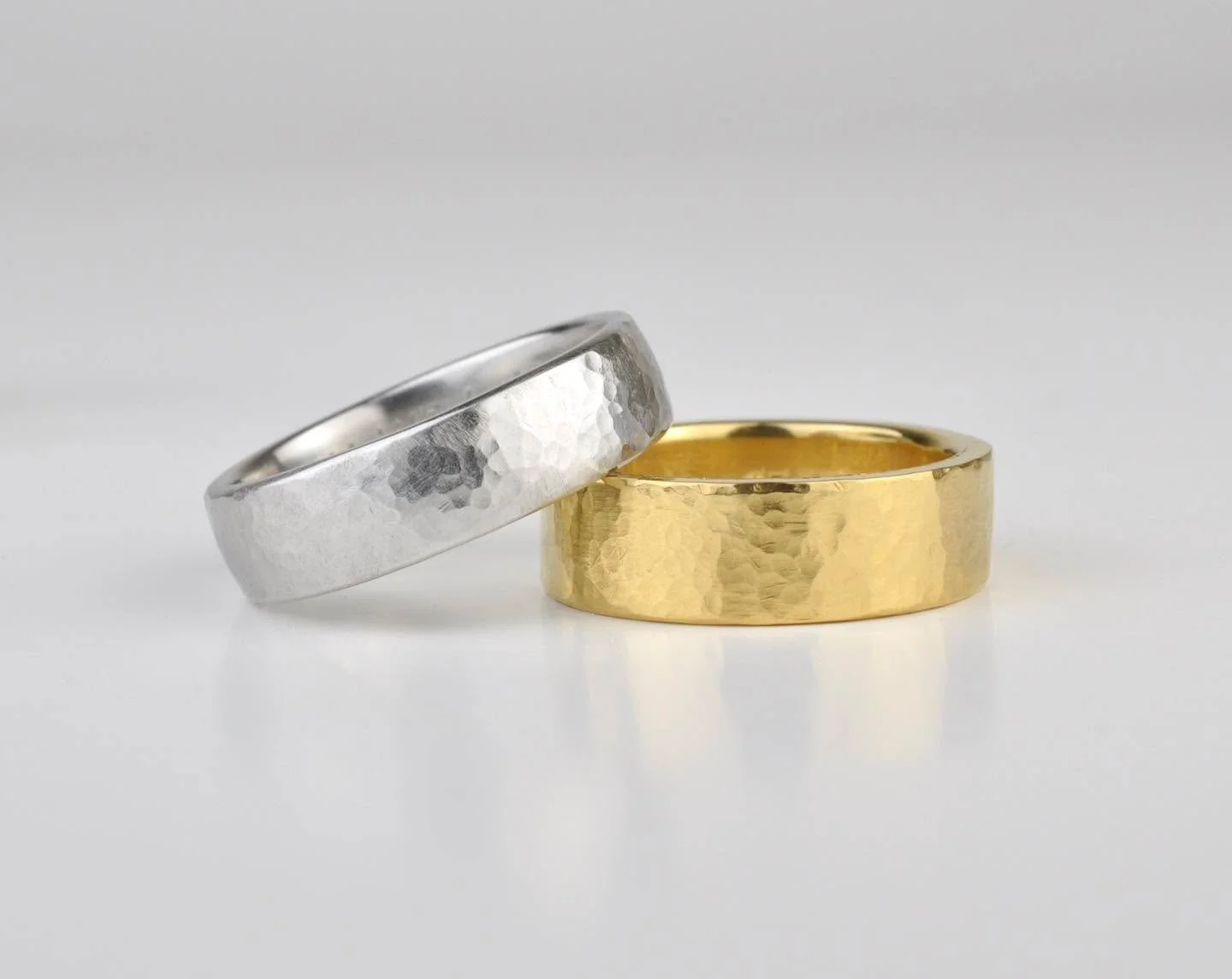 The simple things in life are oftentimes the best things in life. I am known for creating some very detailed rings, but I am just as capable of doing simple hammered textures on plain bands. The rings you see here some of the purest rings I have ever