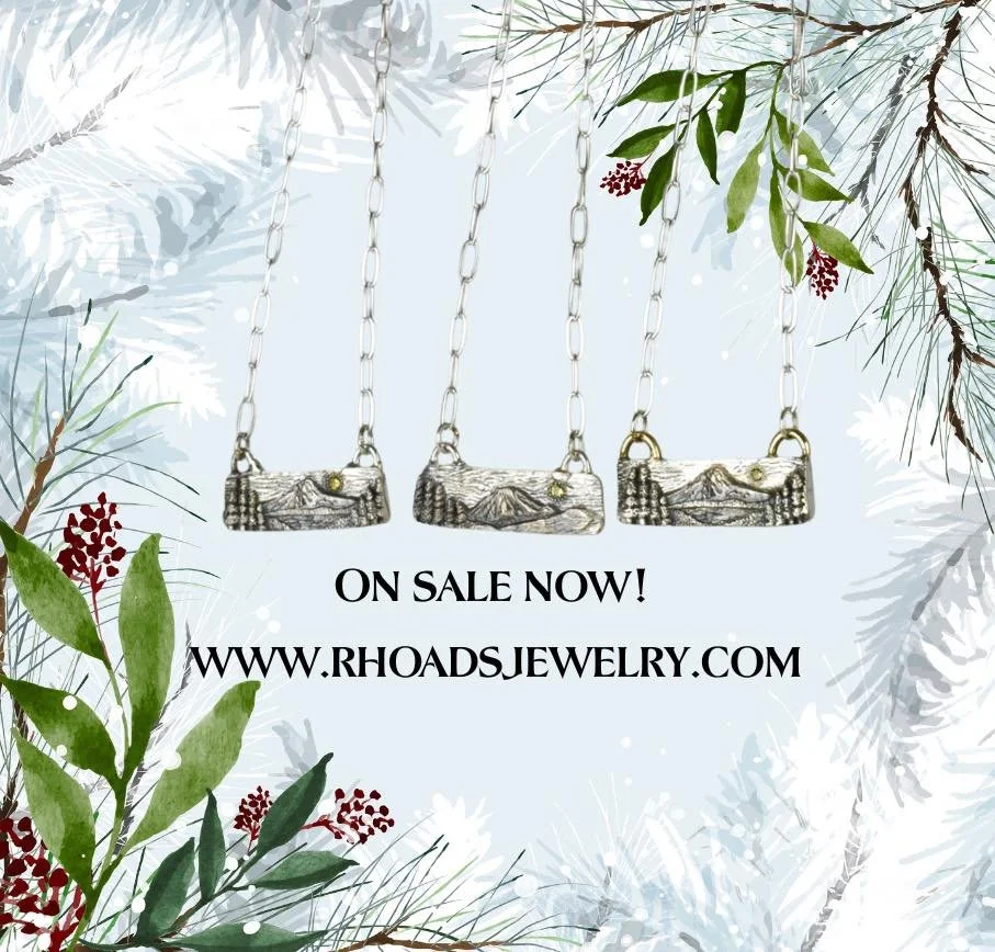 There could be three very happy people this Yule! We have two silver Mt. Hood pendants and one silver Mt. Bachelor pendant available for sale on our website! Each one is set with a .02 carat yellow sapphire for the sun!☀️ 
Stop by our studio or visit