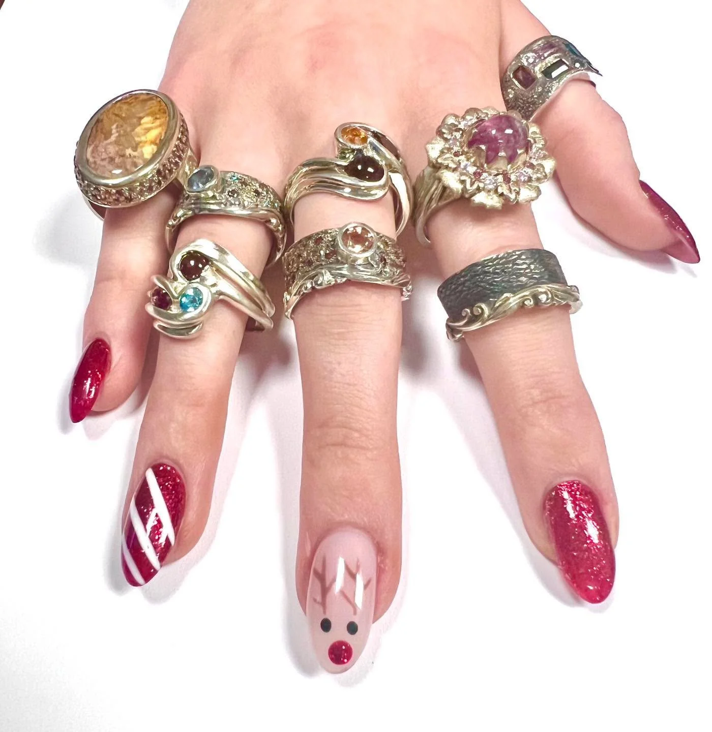 Emaline is modeling all the pretty rings in the studio today!  Everything on her hand is made here in my studio, every gemstone is set by me, and every piece is finished and quality checked by me and Justine. Unique, original designs by Waylon Rhoads