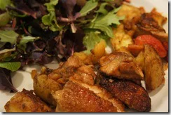 CRISPY CHICKEN THIGHS WITH SQUASHED NEW POTATOES AND TOMATOES