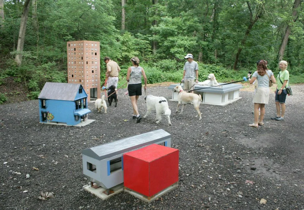 Tea Mäkipää The Dogs of USA from Not Without My Dog , 2011 wood, aluminum, paint, cement dimensions variable