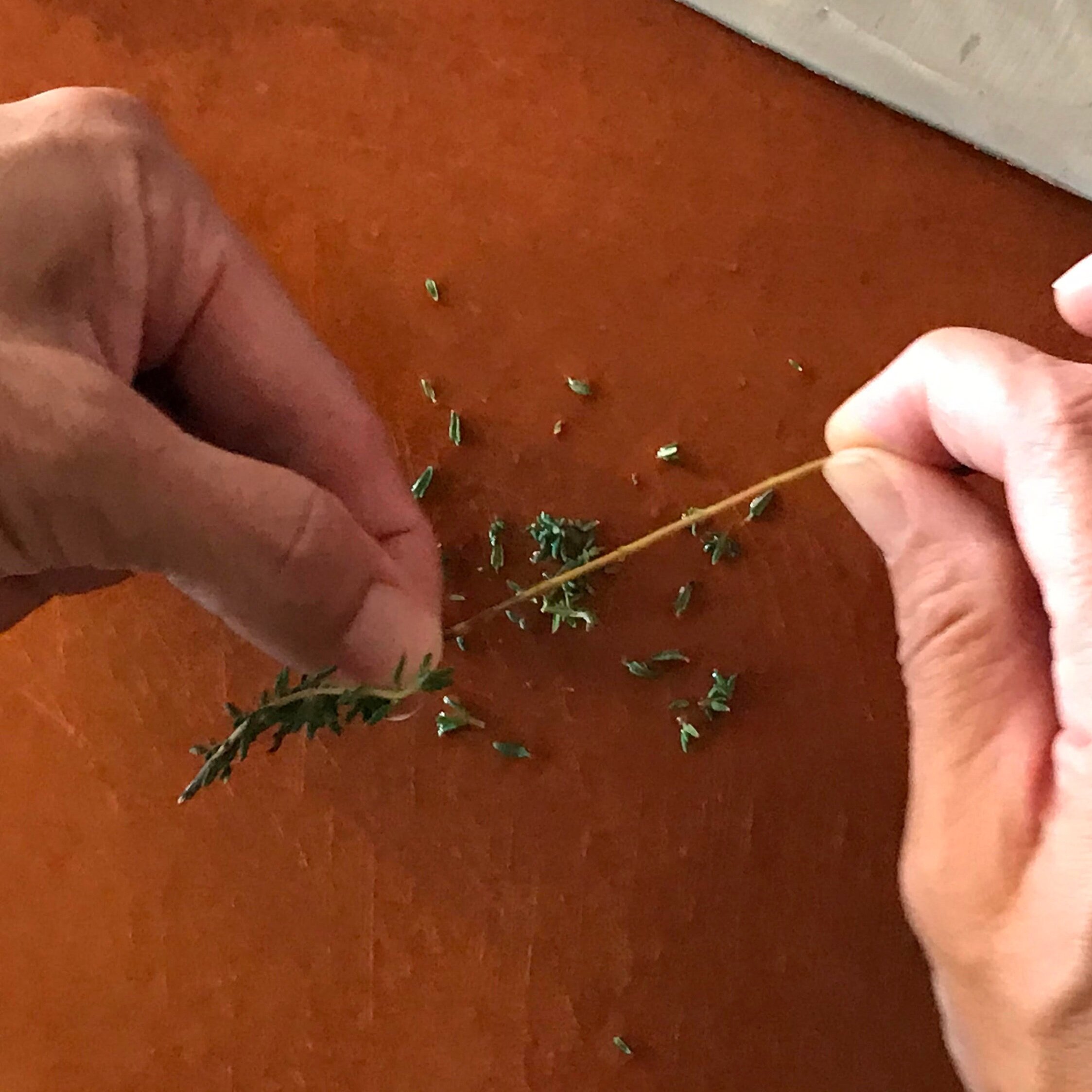 STRIP THE THYME LEAVES FROM THE STEMS