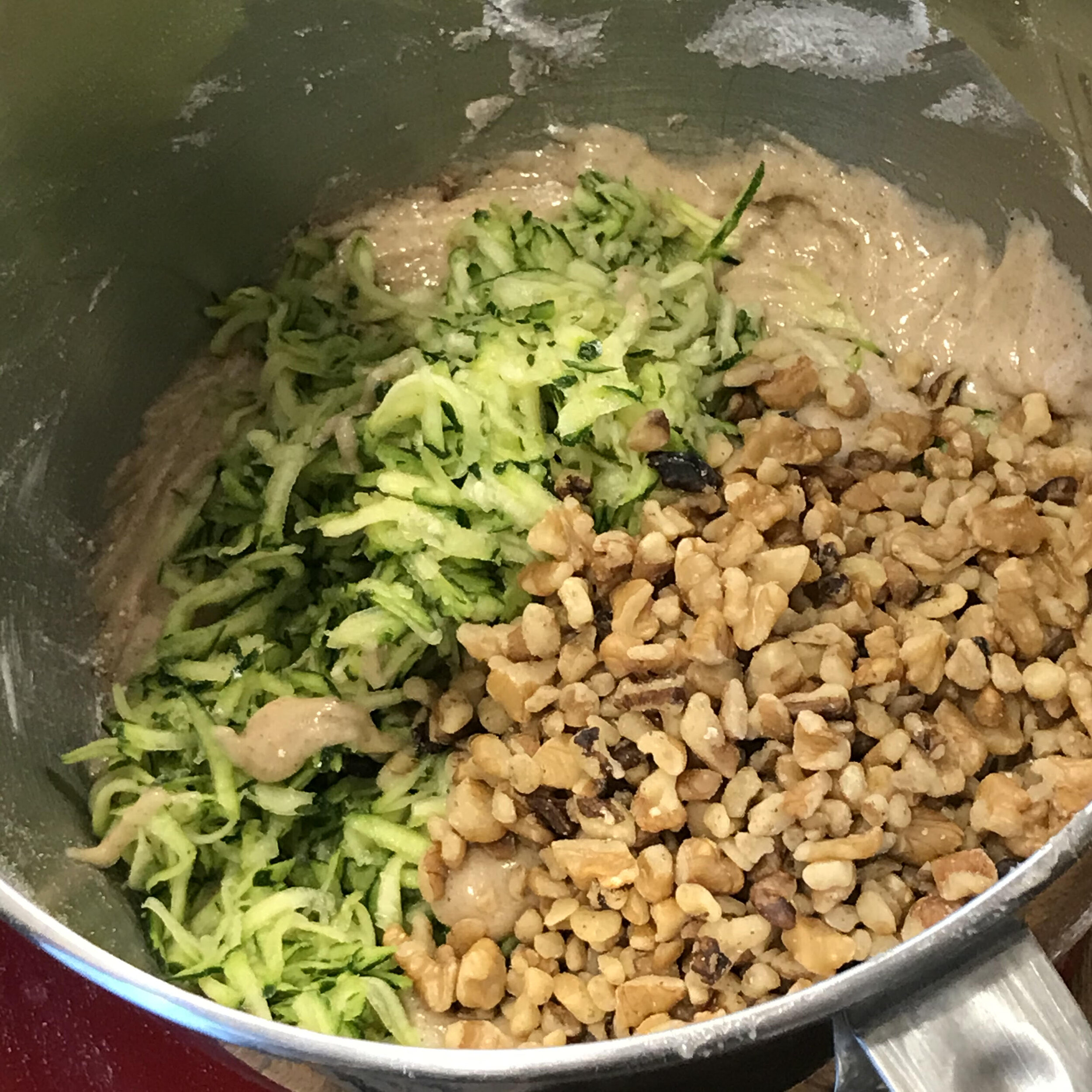 Add the zucchini and walnuts