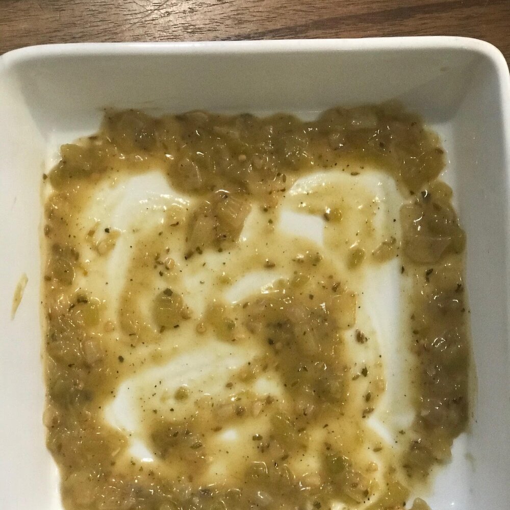 Coat bottom of baking dish with sauce.