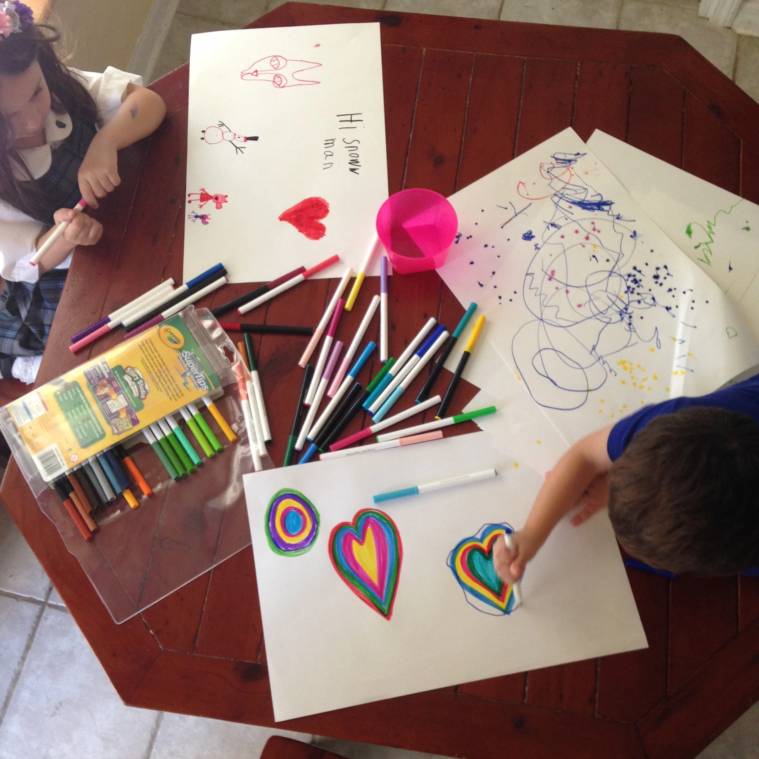 coloring next to a toddler
