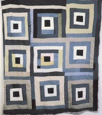 A Gee's Bend quilt in patriotic colors by Alabama Folk School instructor, China Pettway. 