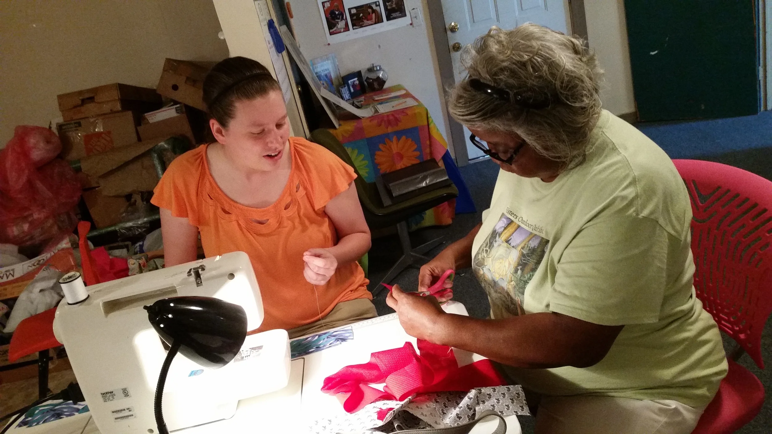 Mary Ann Pettway teaches Whitley how to sew like, "my momma taught me." 