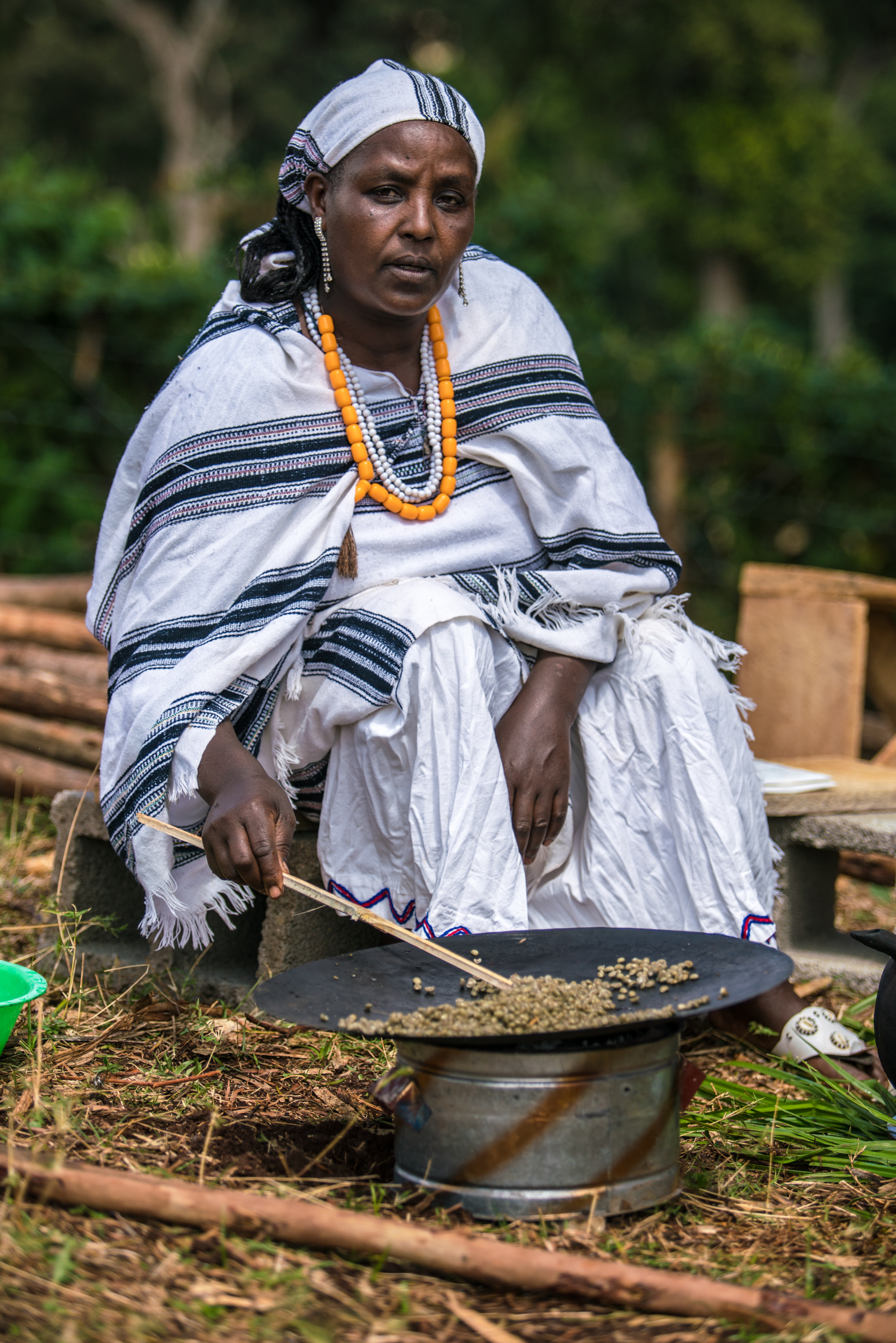 Ethiopian Woman Roasting Beans Outside (Copy)