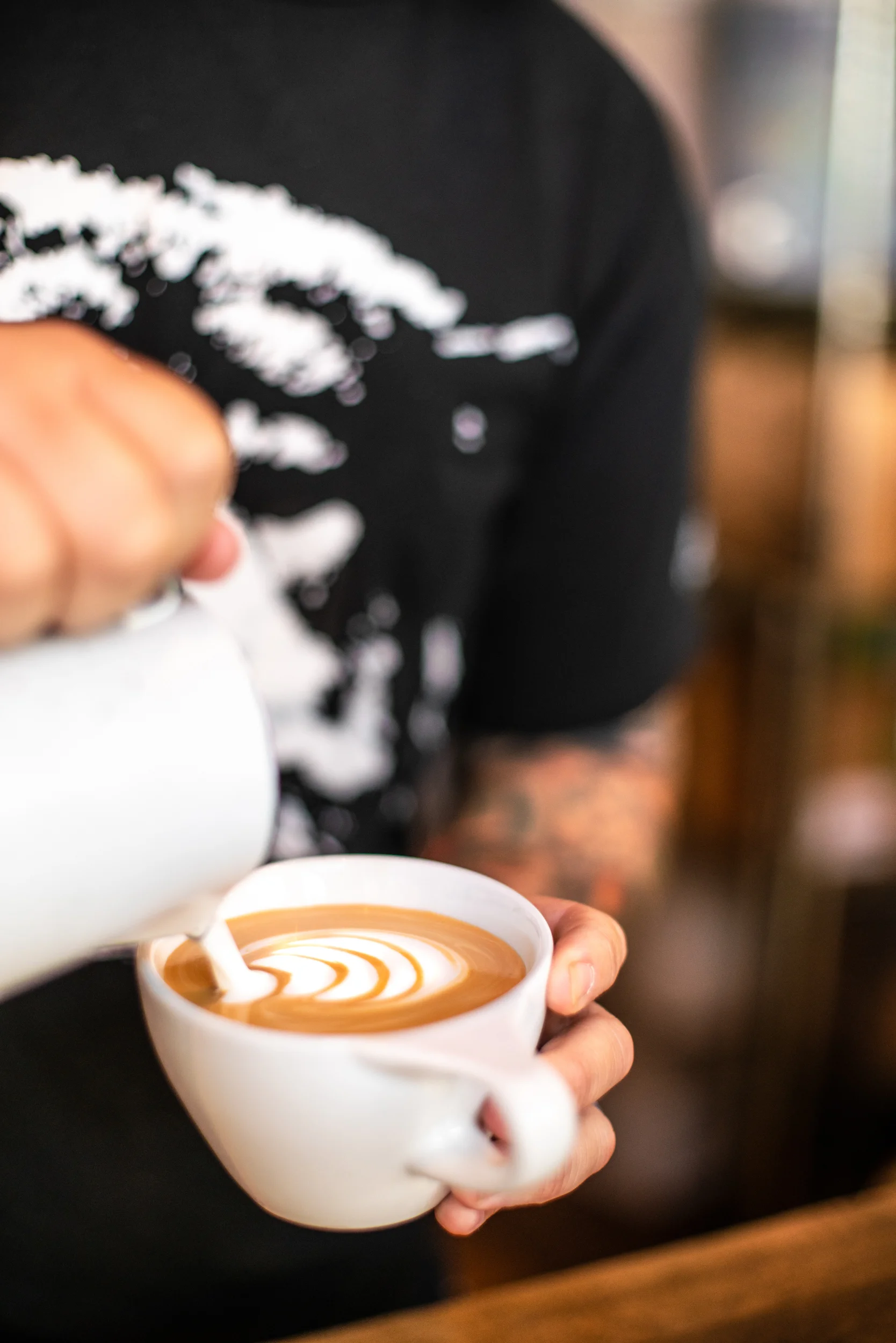 Mike Pouring Milk Into Latte