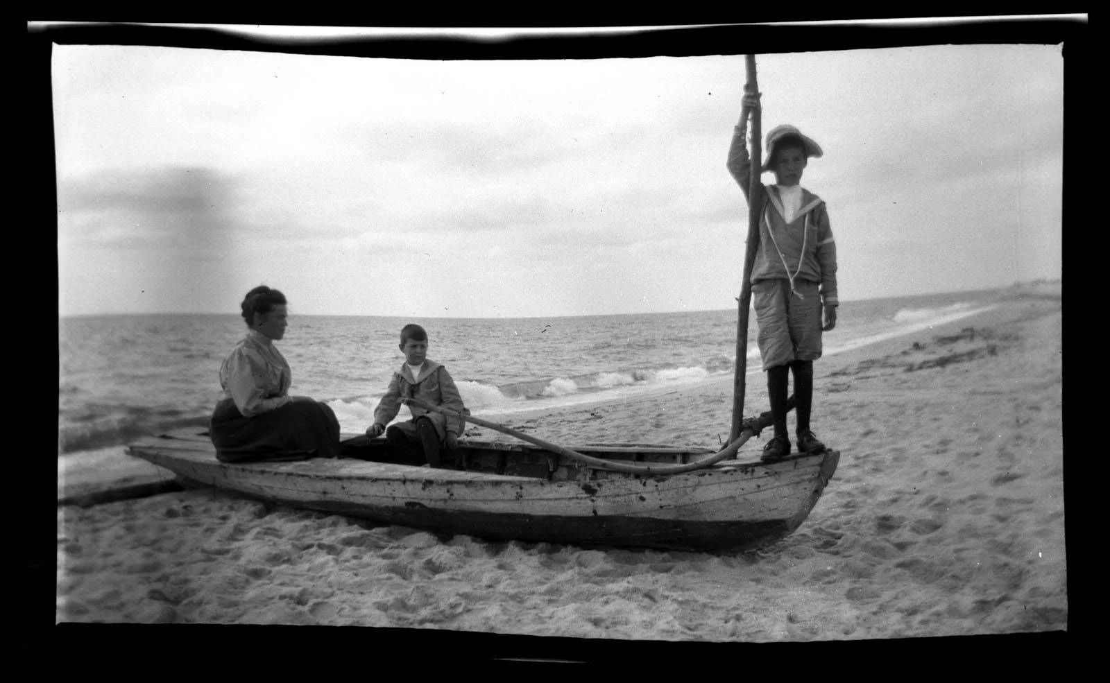 Two boys and woman in boat Sea Girt .jpg